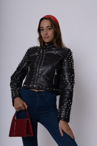 Giacca ecopelle con borchie metallizzata